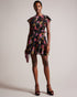 TIIAH-Dresses-Step into effortless elegance with our TIIAH dress. Our glitched floral print offers contemporary style, while the peplum waist enhances the silhouette. It is the ideal option for anyone looking for both style and sophistication. Mini dress Glitched floral print Angel sleeves A-line silhouette Peplum frilled waist Zip fastening Silvia is 5'11" / 1.8m and wears Black in a Ted size 1- Ted Baker Romania